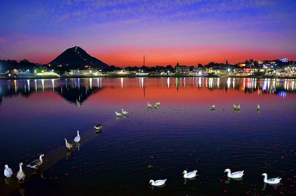 Pushkar — sacred lake at sunset under Savitri hill