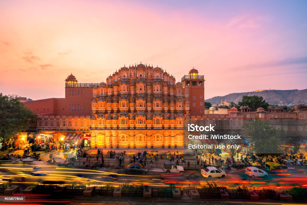 Jaipur - December 15, 2017: The crowd and vehicles in front of Hawa Mahal, India at the evening.